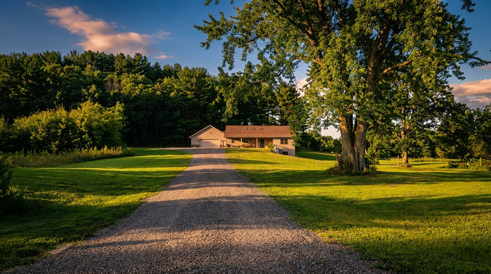 Driveway gravel resurfacing on a rural property